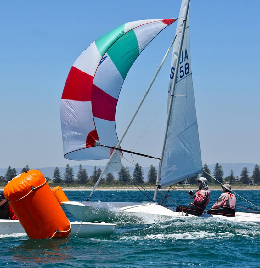 Spinnaker flying during a club race on the Swan River